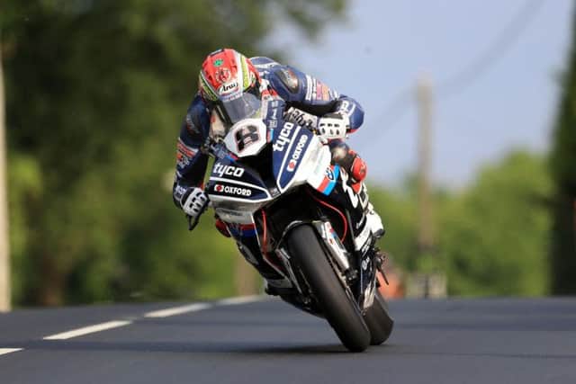 Manxman Dan Kneen in action on the Tyco BMW during Superbike qualifying at the Isle of Man TT in 2018.
