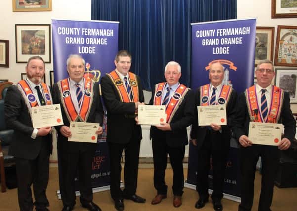 Derek Phair (third from right) was recognised for his input into the life of a private lodge. Mr Phair received his award from Paul Stevenson and is pictured with other nominees