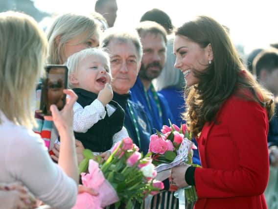 he Duchess of Cambridge meets wellwishers on her arrival for her visit to Windsor Park, Belfast as part of her and the Duke of Cambridge's two day visit to Northern Ireland