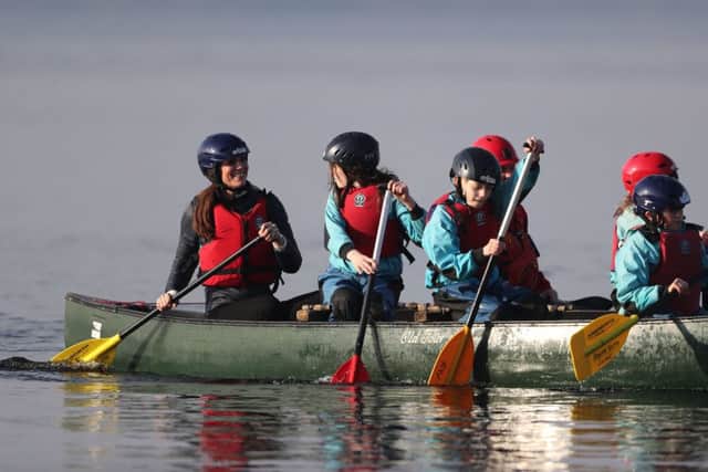 The Duchess of Cambridge takes part in a canoe lesson during her and the Duke of Cambridge's visit to Roscor Youth Village,  Co Fermanagh as part of their two day tour of Northern Ireland