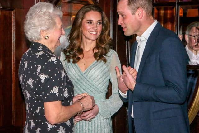 William and Kate chat with Dame Mary Peters
