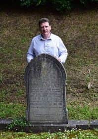 Brian McKernan at the Russell family grave, St Mark's Armagh
