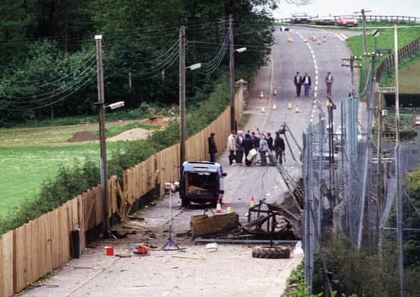 The scene outside Loughgall RUC Station in May 1987 after the SAS shot dead eight IRA terrorists who had launched an attack on the base. The men's deaths are expected to be among more than 90 considered during so-called legacy inquests.