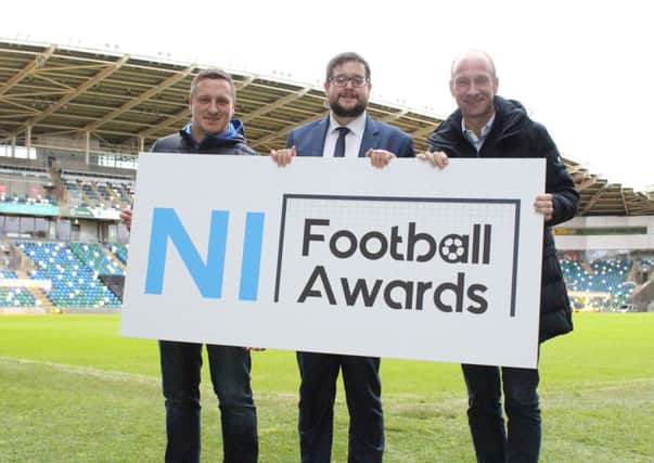 NIFL managing director Andrew Johnston (left) celebrating the launch of this years NI Football Awards with Keith Bailie and Stephen Watson
