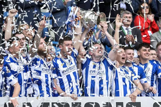 Coleraine's Stephen O'Donnell lifts the Irish Cup in 2018.