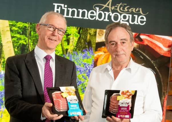 Finnebrogue Artisan chairman Denis Lynn, right, with Brian Dolaghan, executive director with Invest NI