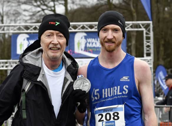 David Flynn, who was the winner of the Walled City 10 Miler on Saturday, pictured with his proud dad Vincent.
