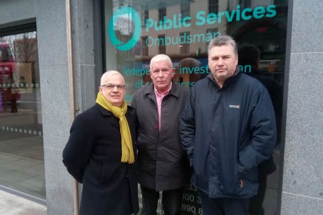 SDLP councillor Tim Attwood with Crumlin Star representatives Paul O'Loan (trustee) and Patrick McGlinchey (secretary) outside the offices of the Local Government Commissioner for Standards.