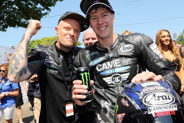Keith Flint celebrates Ian Hutchinson's victory in the opening Supersport TT in 2016.