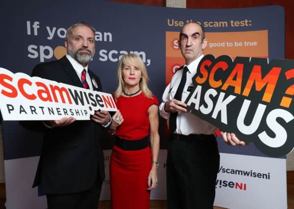 Launching the Scamwise NI initiative at Stormont were (from left) Simon Hutchinson, Post Office head of security, Policing Board vice-chair Debbie Watters and PSNI Chief Superintendent Simon Walls