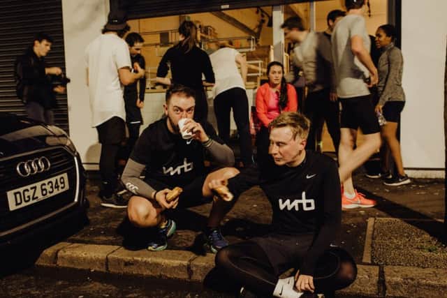 Having a breather (and a doughnut) after a late night run