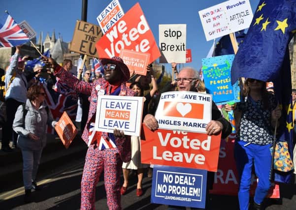 Pro-Brexit and anti-Brexit demonstrators at Westminster