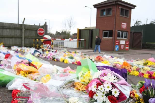 Floral tributes left outside Massereene Barracks in the days after the murders of Mark Quinsey and Patrick Azimkar