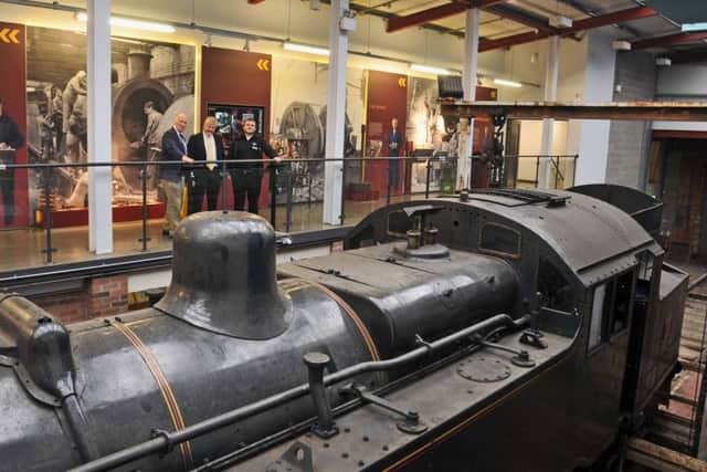 Robin Morton, Councillor Robert Logan and RPSI volunteer Matthew Wilson with the No.4 locomotive built in 1947.