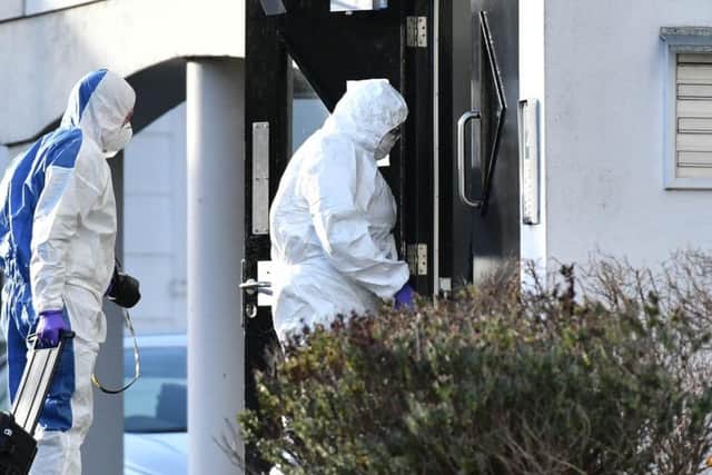 Forensic experts at the home of Giselle Marimon Herrera in Newry