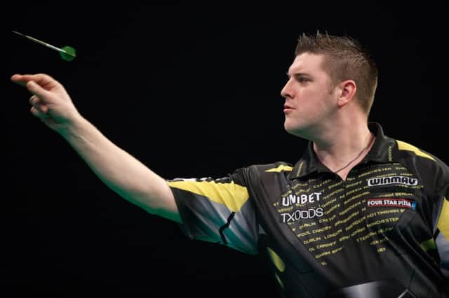 Daryl Gurney in action against James Wade. Steve Welsh/PDC