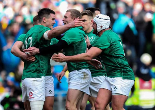 Ireland's Jonathan Sexton celebrates his try with team mates