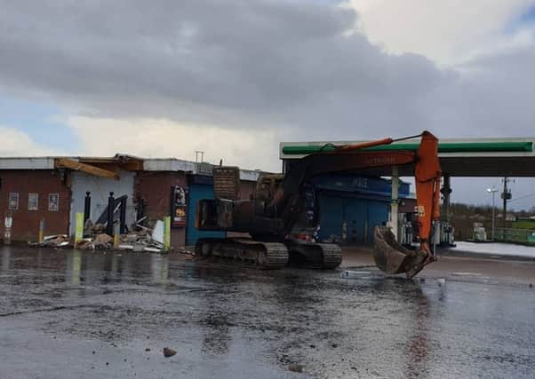 The stolen digger was used to rip an ATM from the wall of the filling station and then set on fire. Pic by lPSNI Dungannon & South Tyrone