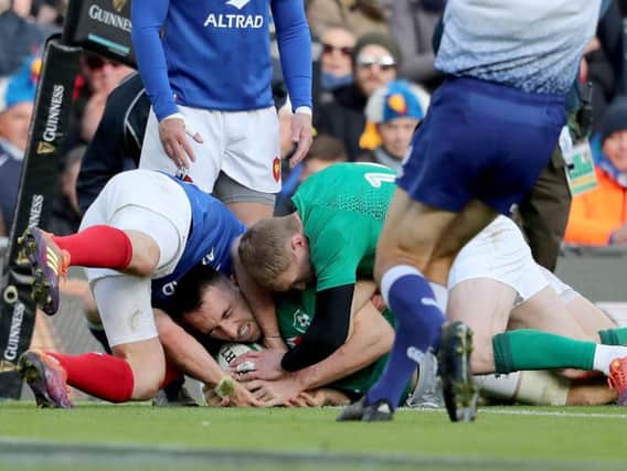 Ireland's Jack Conan goes over for a try against France
