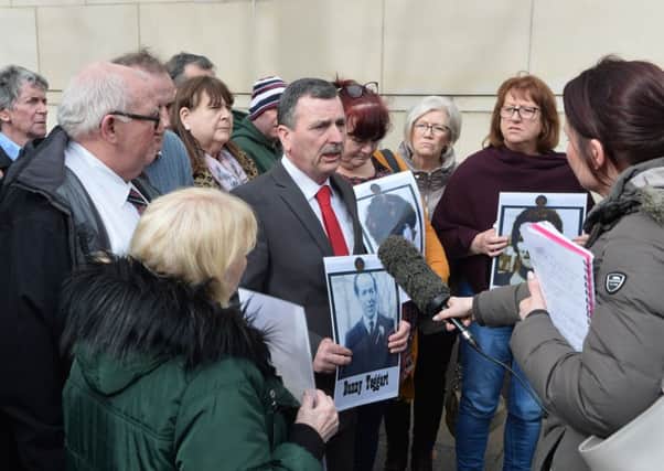 John Teggart, son of Ballymurphy victim Danny Teggart,   speaks to the media before the start of Monday's inquest proceedings