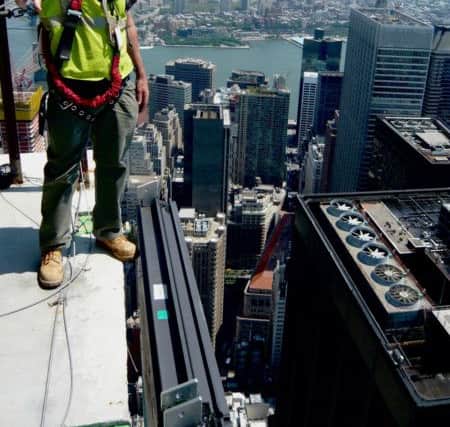 Filming on the 69th floor of 3 WTC when the ironworkers were installing the curtain wall of glass panels