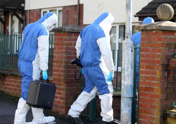 Forensic experts at the scene of Alice Morrow's murder in east Belfast. 


Picture by Jonathan Porter/PressEye