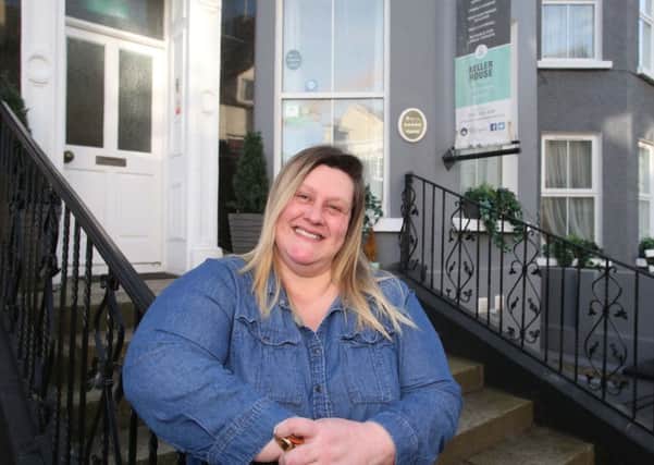 Tamar Brunton, Operations Manager of Portrush Boutique Townhouse Hostel located on Bath Street in Portrush, one of the properties to benefit from the Revitalise scheme funded by the Department for Communities (DfC) and delivered by Causeway Coast and Glens Borough Council.