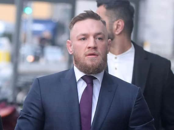 Mixed martial artist Conor McGregor, who has been charged with robbery in the US after allegedly stamping on a fan's mobile phone