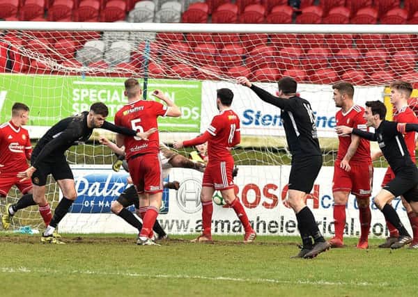 Caolan Loughran's last-gasp goal left Carrick Rangers with a 2-2 draw from the weekend visit to Portadown. Pic by Tony Hendron.