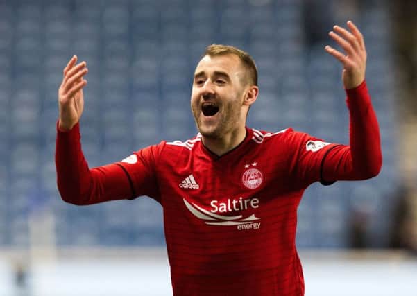 Aberdeen's Niall McGinn celebrates after the win over Rangers in the Scottish Cup