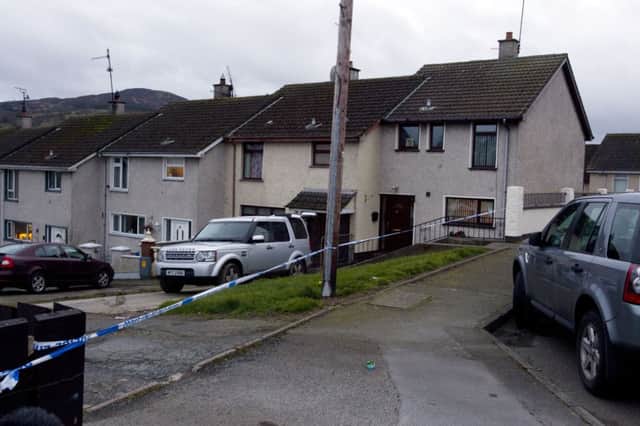 Five people have been arrested on suspicion of murder after a man's body was found in a property in the County Armagh village of Bessbrook