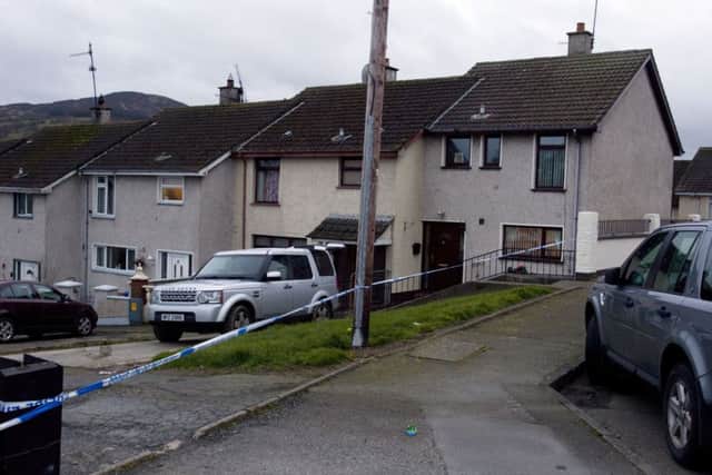 Six people have been arrested on suspicion of murder after a man's body was found in a property in the Co Armagh village of Bessbrook.
