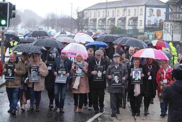 Families of those killed on Bloody Sunday march through the Bogside in Londonderry ahead of the announcement on prosecutions. Pic: Niall Carson/PA Wire