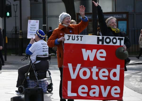 Pro and anti-Brexit protesters in Westminster, London, Thursday March 14, 2019