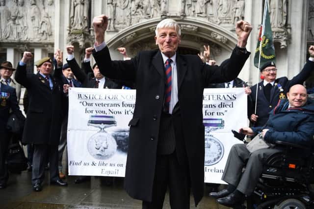 Veteran Dennis Hutchings arrives at the Supreme Court, London, for the latest hearing in his challenge against the decision to hold his trial over an incident in Northern Ireland during the Troubles without a jury. He is accompanied outside the Supreme Court by members of the Justice for NI Veterans and their founder Alan Barry. PRESS ASSOCIATION Photo. Picture date: Thursday March 14, 2019. Photo credit should read: Kirsty O'Connor/PA Wire