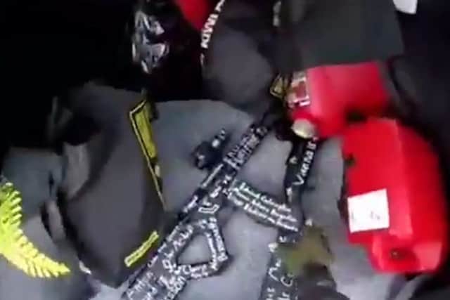 This image taken from the alleged shooter???s video, which was filmed Friday, March 15, 2019, shows a gun in his vehicle in New Zealand. A witness says many people have been killed in a mass shooting at a mosque in the New Zealand city of Christchurch. Police have not described the scale of the shooting but urged people to stay indoors. (AP Photo)