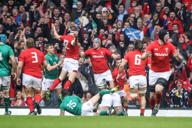 Wales celebrate Hadleigh Parke's try after just 70 seconds against Ireland