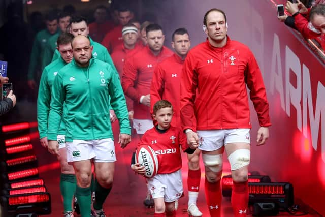 Rory Best and Alun Wyn Jones lead their teams out