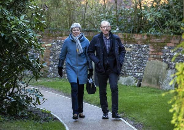 Prime Minister Theresa May arrives with her husband Philip to attend a church service near her Maidenhead constituency. PRESS ASSOCIATION Photo. Picture date: Sunday March 17, 2019. Photo credit should read: Steve Parsons/PA Wire
