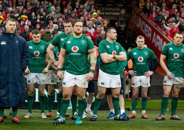 Dejected Ireland players after the 25-7 loss to Wales in Cardiff