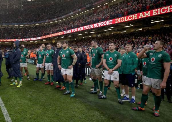 Ireland players dejected after the 25-7 loss to Wales in Cardiff