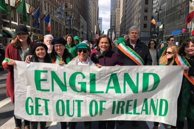 Sinn Fein president Mary Lou McDonald with the offending banner in New York