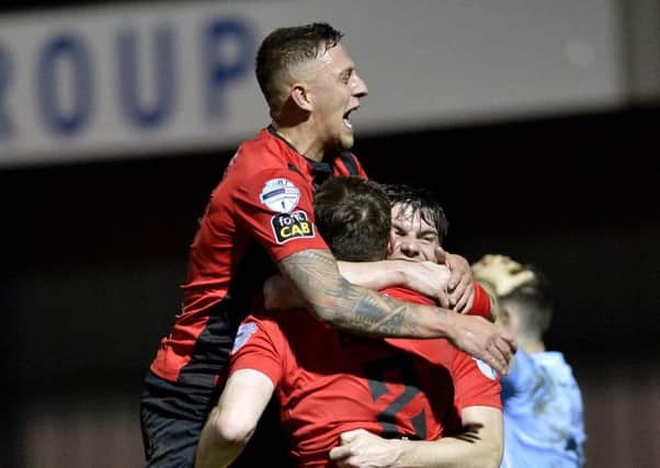 Crusaders celebrate moving into a 2-1 lead during victory over Warrenpoint Town. Pic by INPHO.
