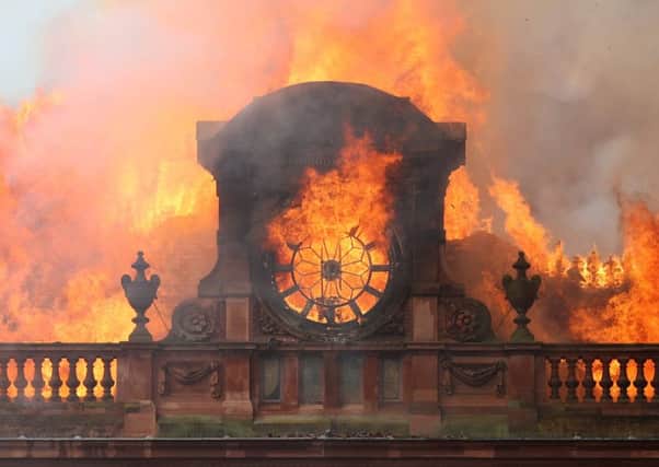 Flames from a major blaze which broke out at the Primark store in Belfast city centre. Photo credit: Liam McBurney /PA Wire