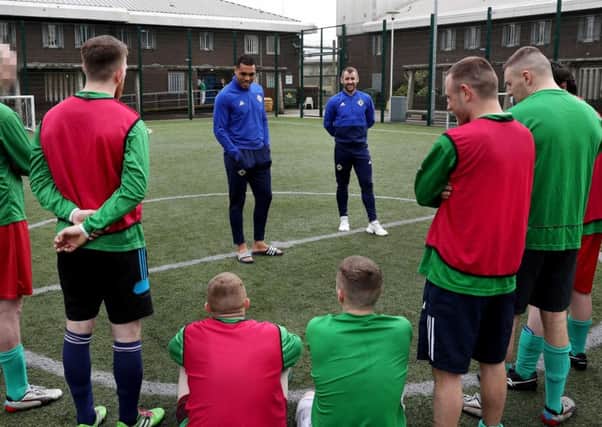 Josh Magennis and Niall McGinn visit the 'Stay Onside' programme at HMP Maghaberry