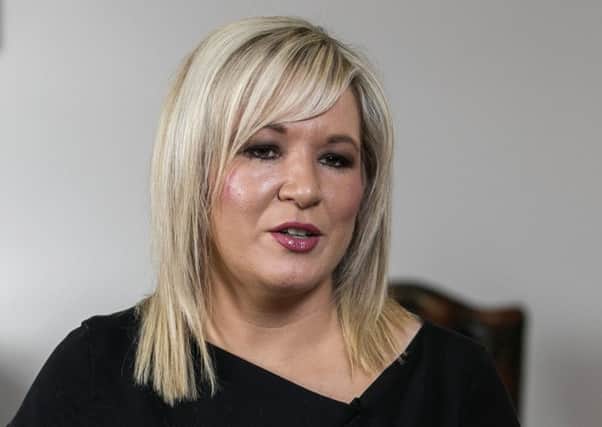 Michelle O'Neill accused the government and DUP of 'taking a hatchet and sledgehammer' to the NI economy