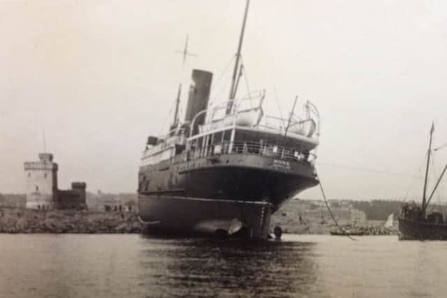 SS Mona, formerly Hazel, aground on the Conister Rock, Douglas Bay, July 1930