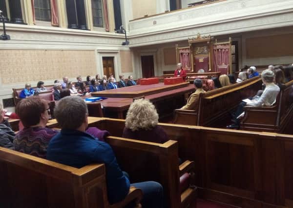 Anne Graham, sister of the late Edgar Graham, speaks at the end of the Edgar Graham Memorial speaking competition, in the senate, Stormont, March 20 2019