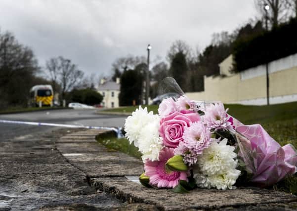 Flowers outside the Greenvale Hotel in Cookstown, Co. Tyrone, in Northern Ireland where three young people died at a party that was being hosted at the hotel on St Patrick's Day evening.. Photo credit: Liam McBurney/PA Wire