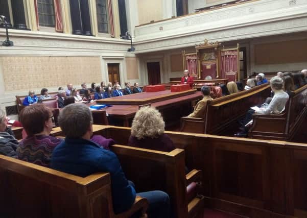 Anne Graham, sister of the late Edgar Graham, speaks at the close of the Edgar Graham Memorial speaking competition, in the senate, Stormont, March 20 2019